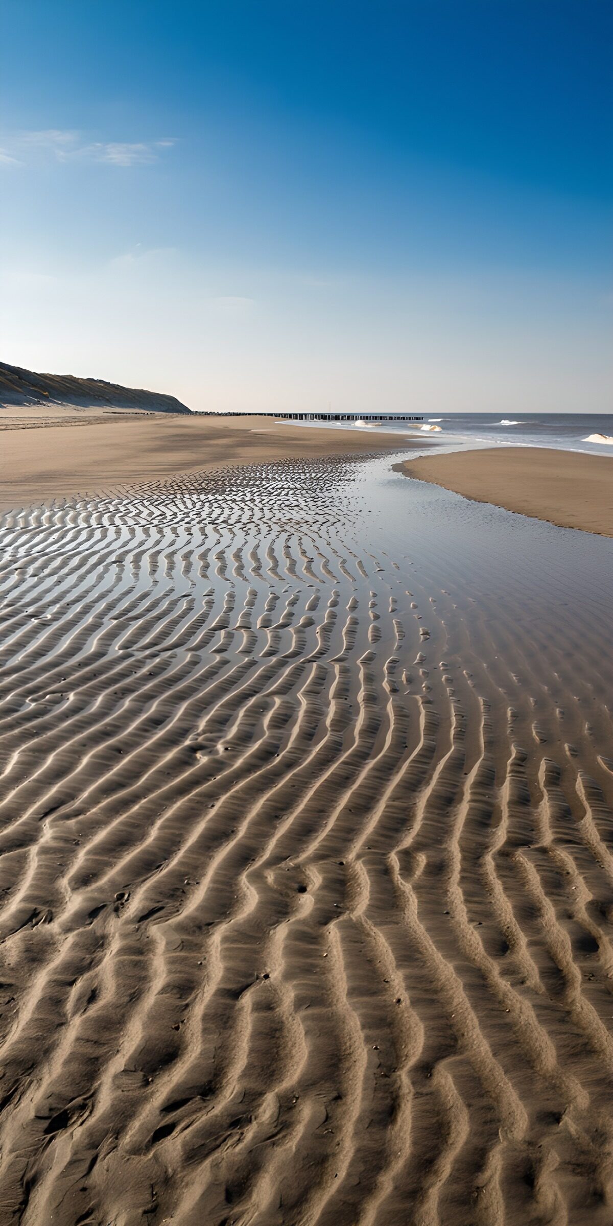 TP17242: Rustige strandscène met waterrimpels